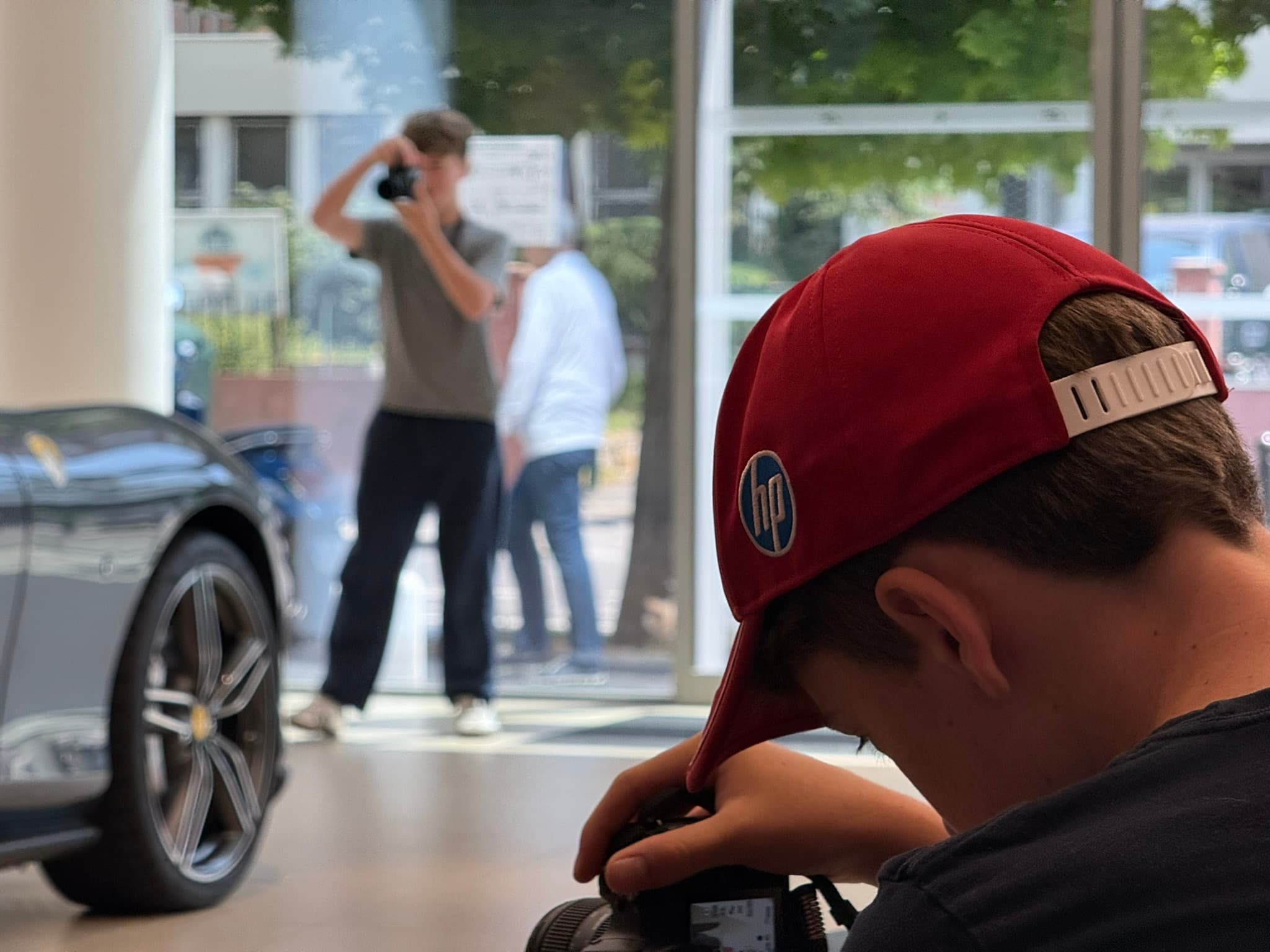Both brothers shooting at a dealership
